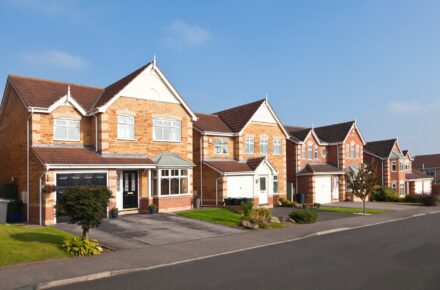 big modern houses on a street